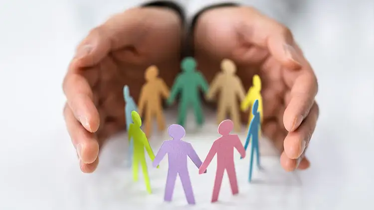 Diverse group of business professionals collaborating around a table