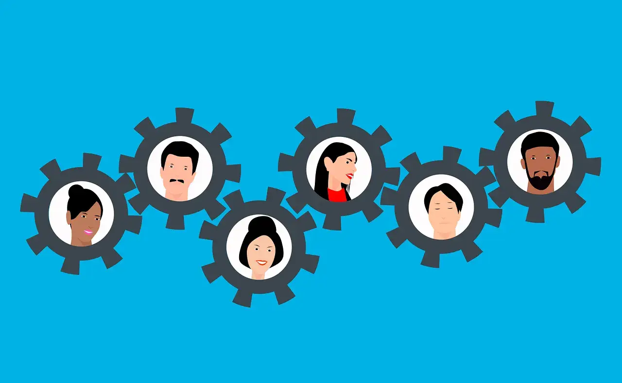 Diverse workers pictured inside interlocking gears, representing connected tiers of a supplier diversity program